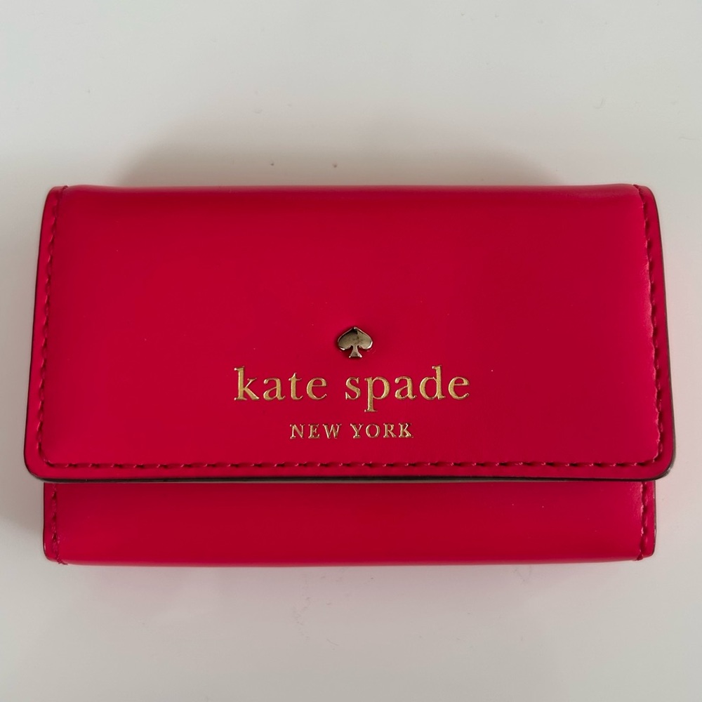 Kate Spade pink card holder gold tone hardware snap closure